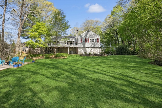 22 Washington Dr, Centerport, NY 11721 - view of green lawn featuring a deck