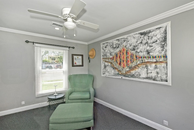 sitting room with baseboards, crown molding, ceiling fan, and visible vents