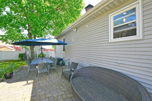 view of patio / terrace with fence and outdoor dining space
