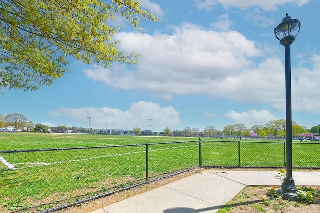 exterior space featuring fence and a yard