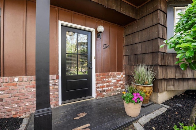 2 Yorktown Rd, Dix Hills, NY 11746 - view of exterior entry featuring brick siding