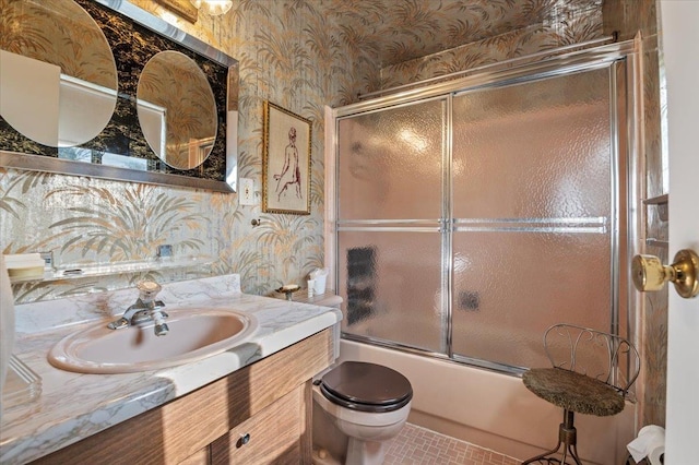 2 Yorktown Rd, Dix Hills, NY 11746 - full bathroom featuring toilet, wallpapered walls, combined bath / shower with glass door, and tile patterned flooring