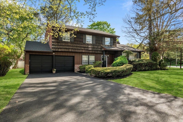 2 Yorktown Rd, Dix Hills, NY 11746 - split level home with driveway, a front lawn, and brick siding