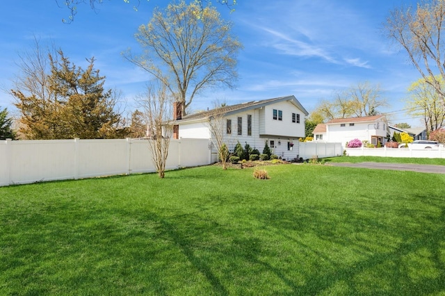 view of yard with fence