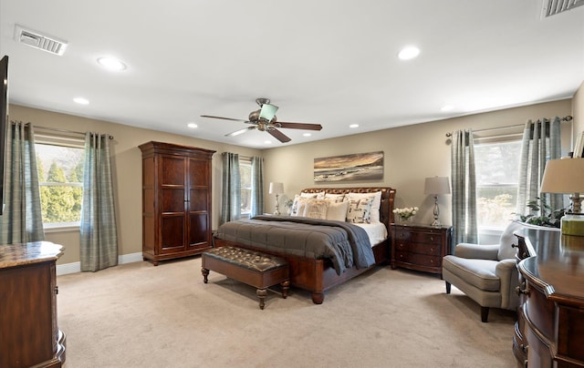 bedroom featuring ceiling fan, light carpet, recessed lighting, and visible vents