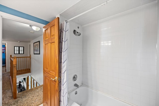 bathroom featuring shower / tub combo with curtain