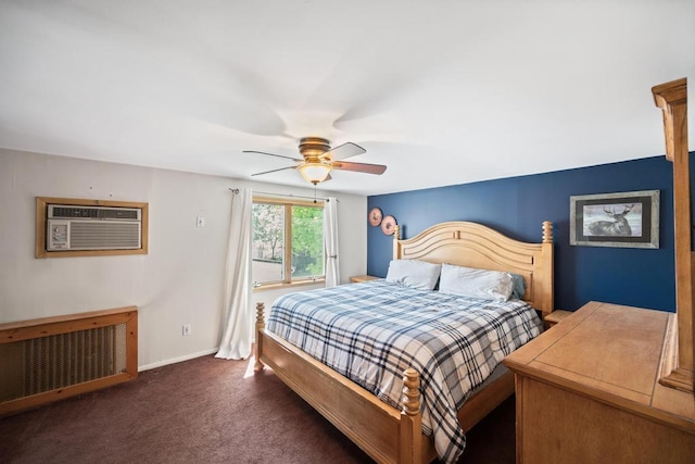 bedroom with carpet floors, radiator heating unit, a ceiling fan, baseboards, and a wall unit AC