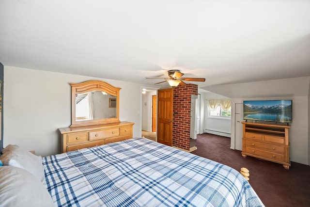 bedroom featuring dark colored carpet, ceiling fan, and a baseboard heating unit