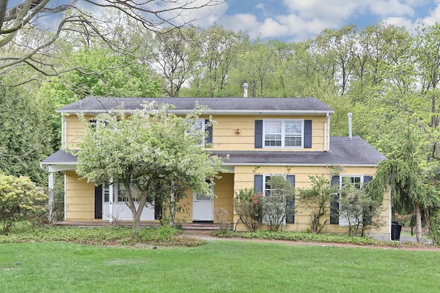 7 Macintosh Ln, Monsey, NY 10952 - view of front of home featuring a shingled roof and a front lawn