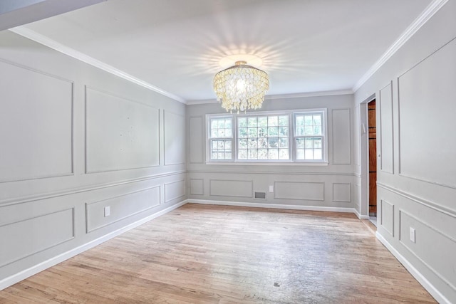 7 Macintosh Ln, Monsey, NY 10952 - interior space featuring light wood-style floors, a decorative wall, and an inviting chandelier