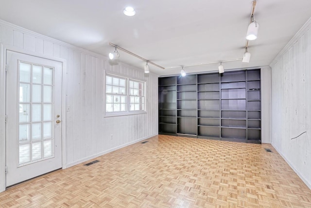 7 Macintosh Ln, Monsey, NY 10952 - garage featuring baseboards and visible vents