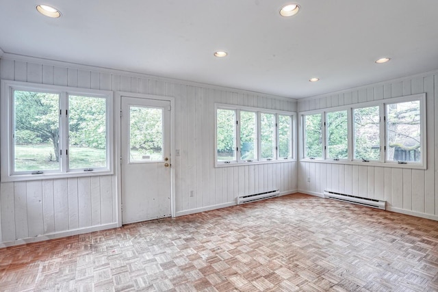 7 Macintosh Ln, Monsey, NY 10952 - unfurnished sunroom featuring a baseboard heating unit