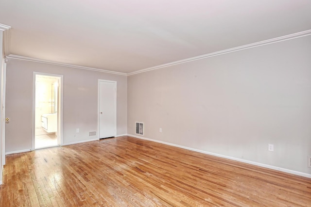 7 Macintosh Ln, Monsey, NY 10952 - empty room with baseboards, ornamental molding, light wood finished floors, and visible vents