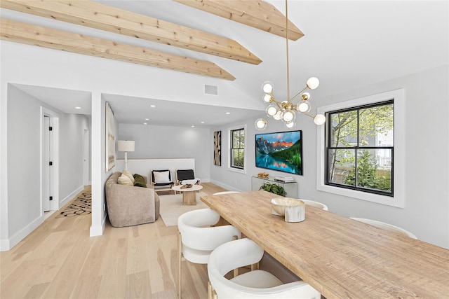 dining area featuring plenty of natural light, wood finished floors, and recessed lighting