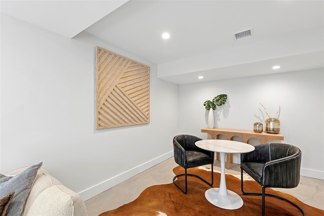living area featuring baseboards, recessed lighting, and visible vents