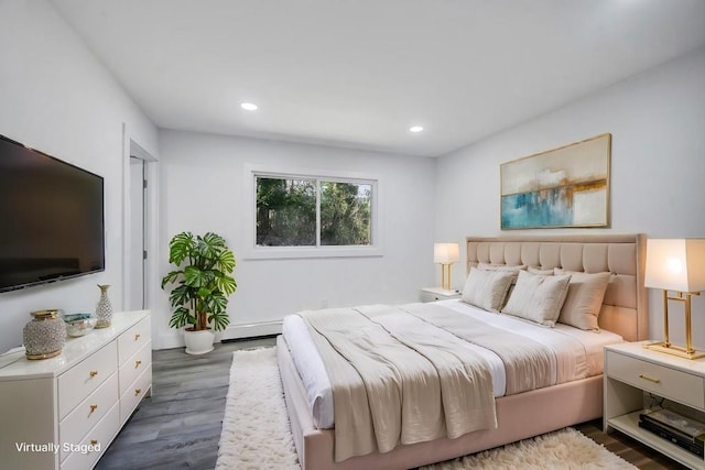 bedroom featuring recessed lighting and wood finished floors