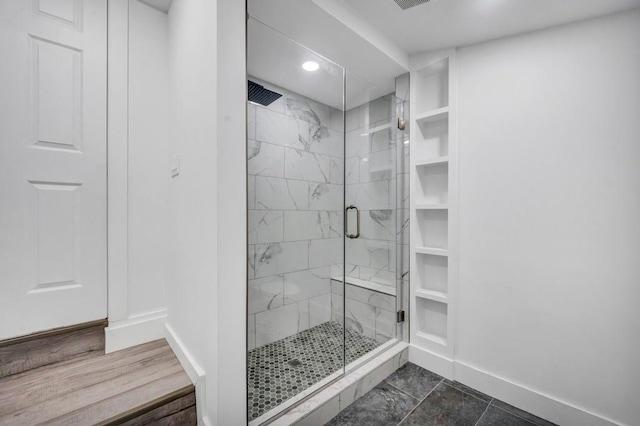 bathroom with recessed lighting, baseboards, visible vents, and a shower stall