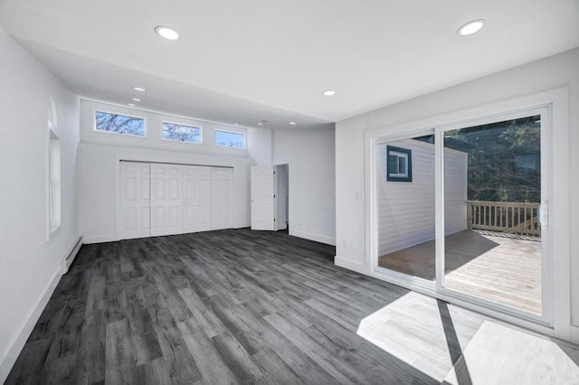 interior space with recessed lighting, baseboards, and dark wood finished floors