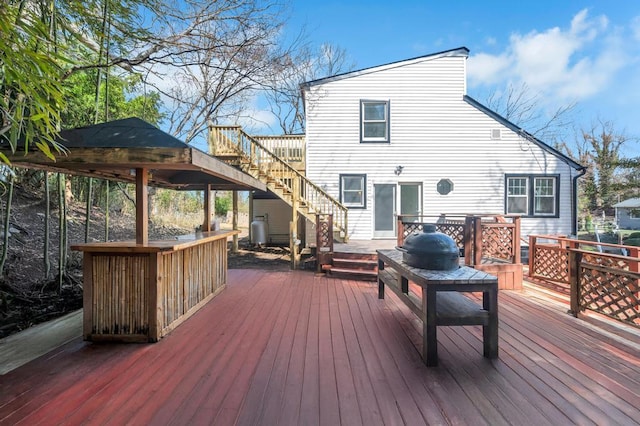 deck featuring stairs