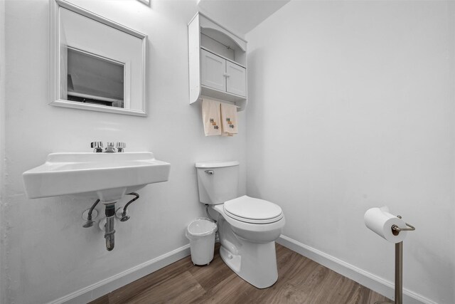 2816 Whispering Hls, Chester, NY 10918 - bathroom featuring wood finished floors, baseboards, and toilet