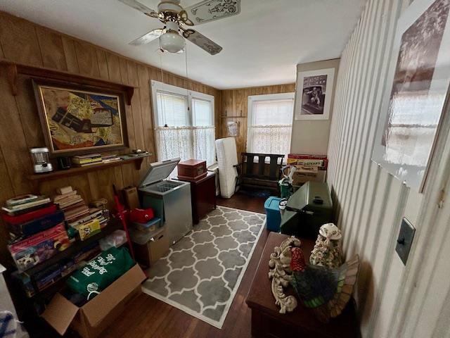 43-51 166th St, Flushing, NY 11358 - interior space with a ceiling fan, wood finished floors, and wooden walls