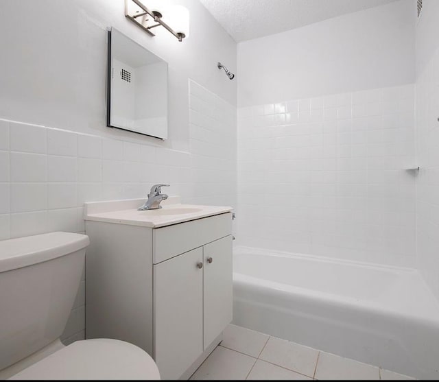 39-60 54th St Unit 7U, Woodside, NY 11377 - bathroom with toilet, shower / tub combination, tile walls, tile patterned flooring, and vanity