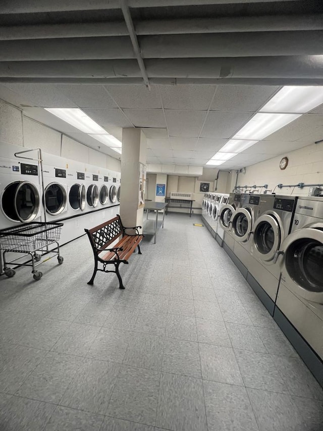 39-60 54th St Unit 7U, Woodside, NY 11377 - community laundry featuring independent washer and dryer and tile patterned floors