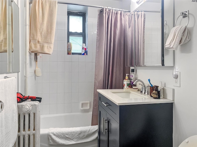 full bathroom with shower / bath combo with shower curtain, radiator heating unit, and vanity