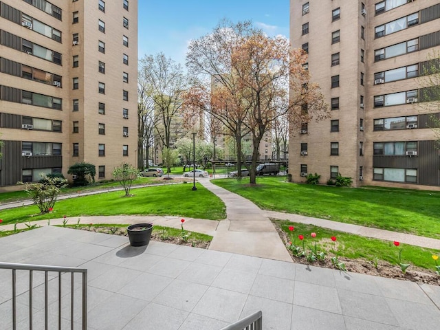 surrounding community with a yard