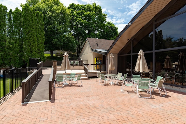 412 Crystal Hill Ln, Poughkeepsie, NY 12603 - view of patio featuring fence, outdoor dining space, and a deck