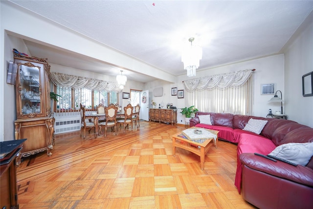 1464 W 5th St, Brooklyn, NY 11204 - living room featuring a chandelier and radiator