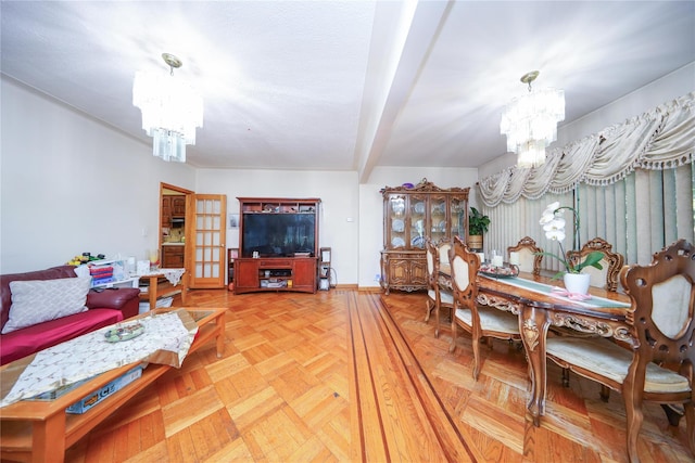 1464 W 5th St, Brooklyn, NY 11204 - dining area featuring a chandelier and baseboards
