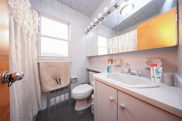 1464 W 5th St, Brooklyn, NY 11204 - bathroom featuring toilet, vanity, and tile walls
