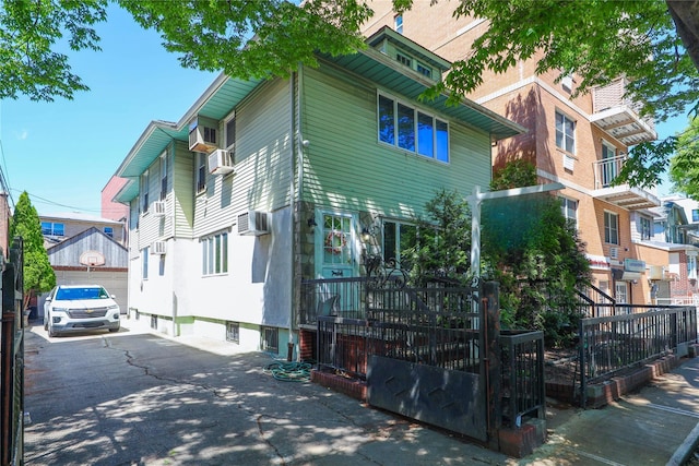 1464 W 5th St, Brooklyn, NY 11204 - view of home's exterior with a garage