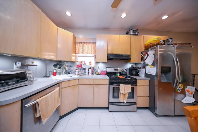 1464 W 5th St, Brooklyn, NY 11204 - kitchen with stainless steel appliances, under cabinet range hood, a sink, light countertops, and recessed lighting