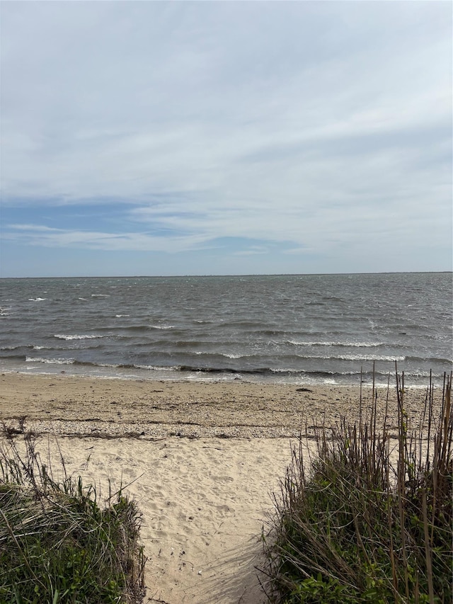 property view of water featuring a view of the beach