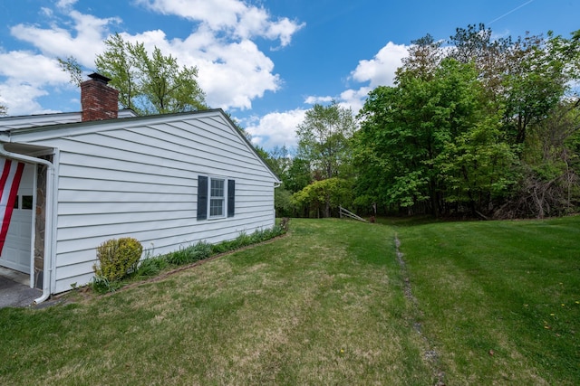 11 Mcintosh Dr, Poughkeepsie, NY 12603 - view of side of property featuring a chimney and a lawn