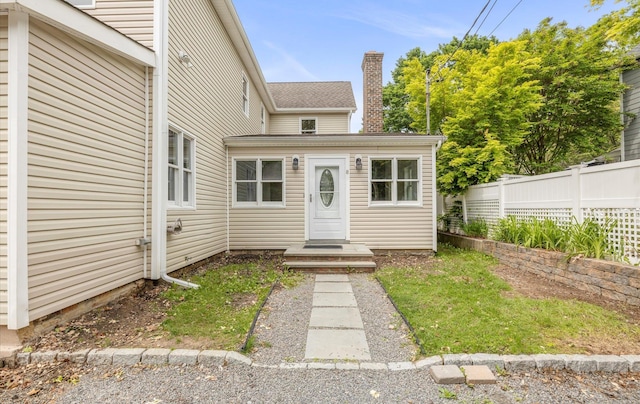 8 Maple St, Glenwood Landing, NY 11547 - entrance to property featuring a chimney