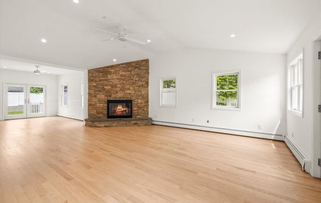 8 Maple St, Glenwood Landing, NY 11547 - unfurnished living room with a ceiling fan, baseboard heating, healthy amount of natural light, vaulted ceiling, and recessed lighting