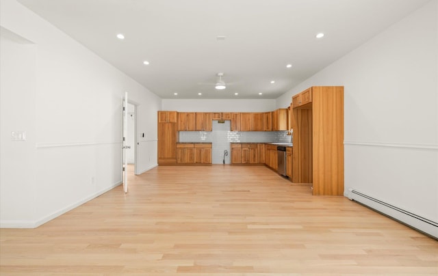 8 Maple St, Glenwood Landing, NY 11547 - kitchen featuring stainless steel dishwasher, a baseboard heating unit, tasteful backsplash, recessed lighting, and light wood-style flooring