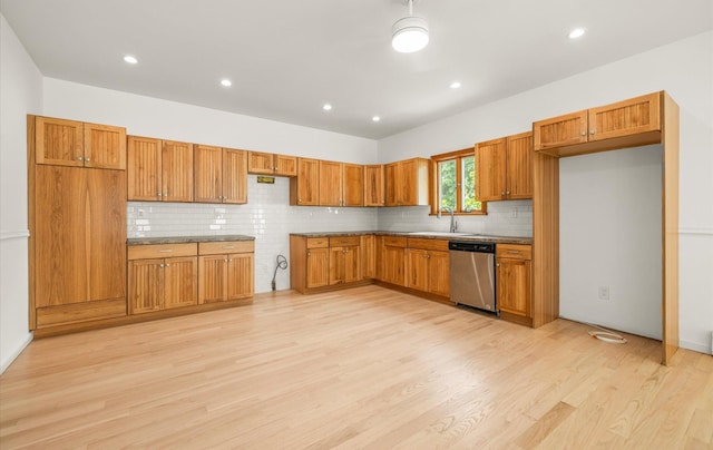 8 Maple St, Glenwood Landing, NY 11547 - kitchen with stainless steel dishwasher, a sink, tasteful backsplash, light wood-type flooring, and recessed lighting
