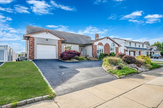3452 Ocean Ave, Oceanside, NY 11572 - view of front of house featuring a garage, driveway, brick siding, a front lawn, and a chimney