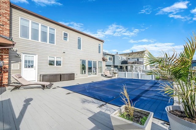 3452 Ocean Ave, Oceanside, NY 11572 - view of swimming pool with a deck, a covered pool, and a residential view