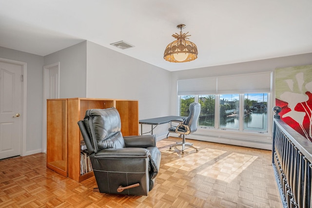 3452 Ocean Ave, Oceanside, NY 11572 - sitting room with baseboard heating and baseboards