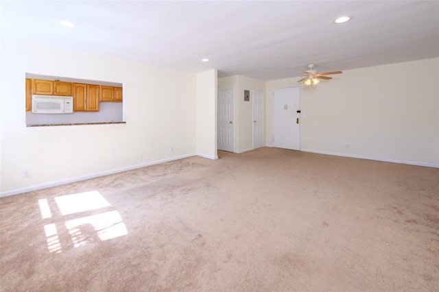 4 Sadore Ln Unit 3M, Yonkers, NY 10710 - empty room with light carpet, ceiling fan, recessed lighting, and baseboards