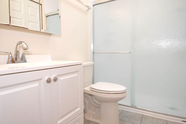 10 Aspinwall Rd, Red Hook, NY 12571 - bathroom with toilet, a shower stall, tile patterned flooring, and vanity