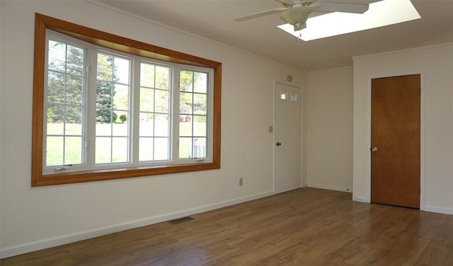 10 Aspinwall Rd, Red Hook, NY 12571 - empty room featuring visible vents, ornamental molding, ceiling fan, and wood finished floors