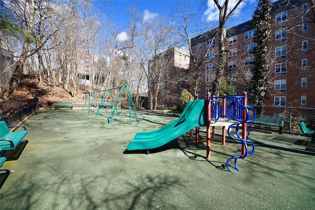 community jungle gym with fence