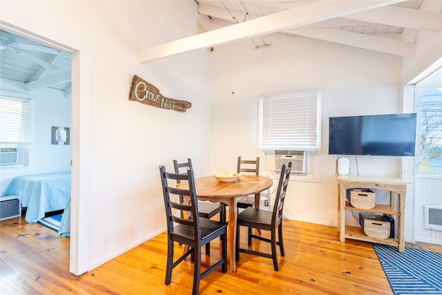 dining area with light wood-type flooring and a healthy amount of sunlight