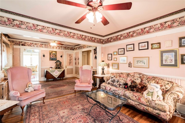 44 Jackson St, Fishkill, NY 12524 - living room with crown molding, ceiling fan, wainscoting, and wood finished floors